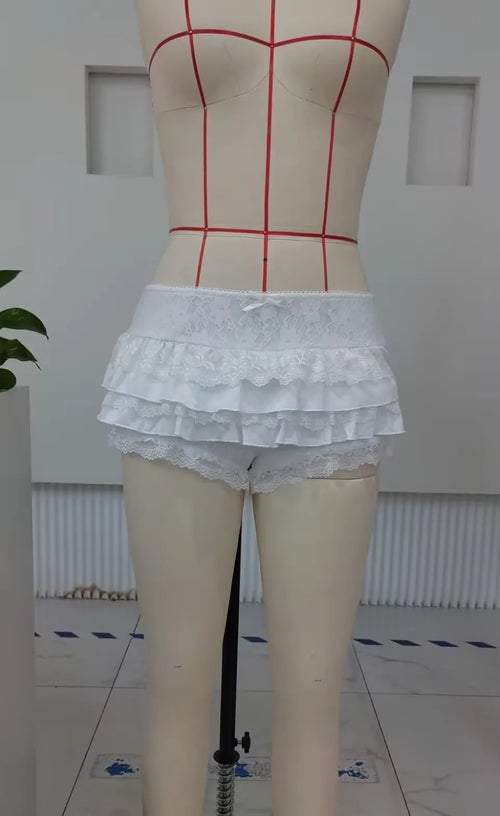 Women's white lace summer shorts, perfect for beach outings