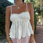 White summer top with lace detailing, perfect for beach outings