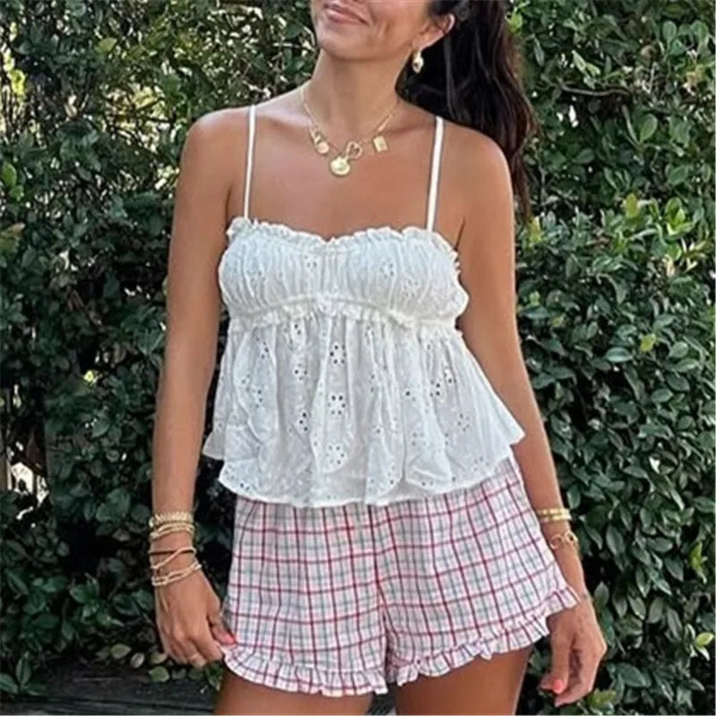 White summer top with lace detailing, ideal for casual outings