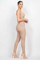 Stylish summer travel jumpsuit for women in beige with a fitted design and ankle length