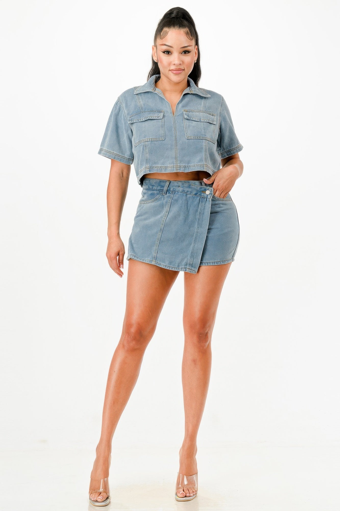 Stylish Women's Denim Set featuring a cropped shirt and mini skirt, perfect for summer travel outfits for women
