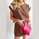 YNIQUE summer vacation two piece outfit brown top and shorts with white and black accents