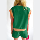 YNIQUE summer vacation two piece outfit with green and beige top and matching shorts