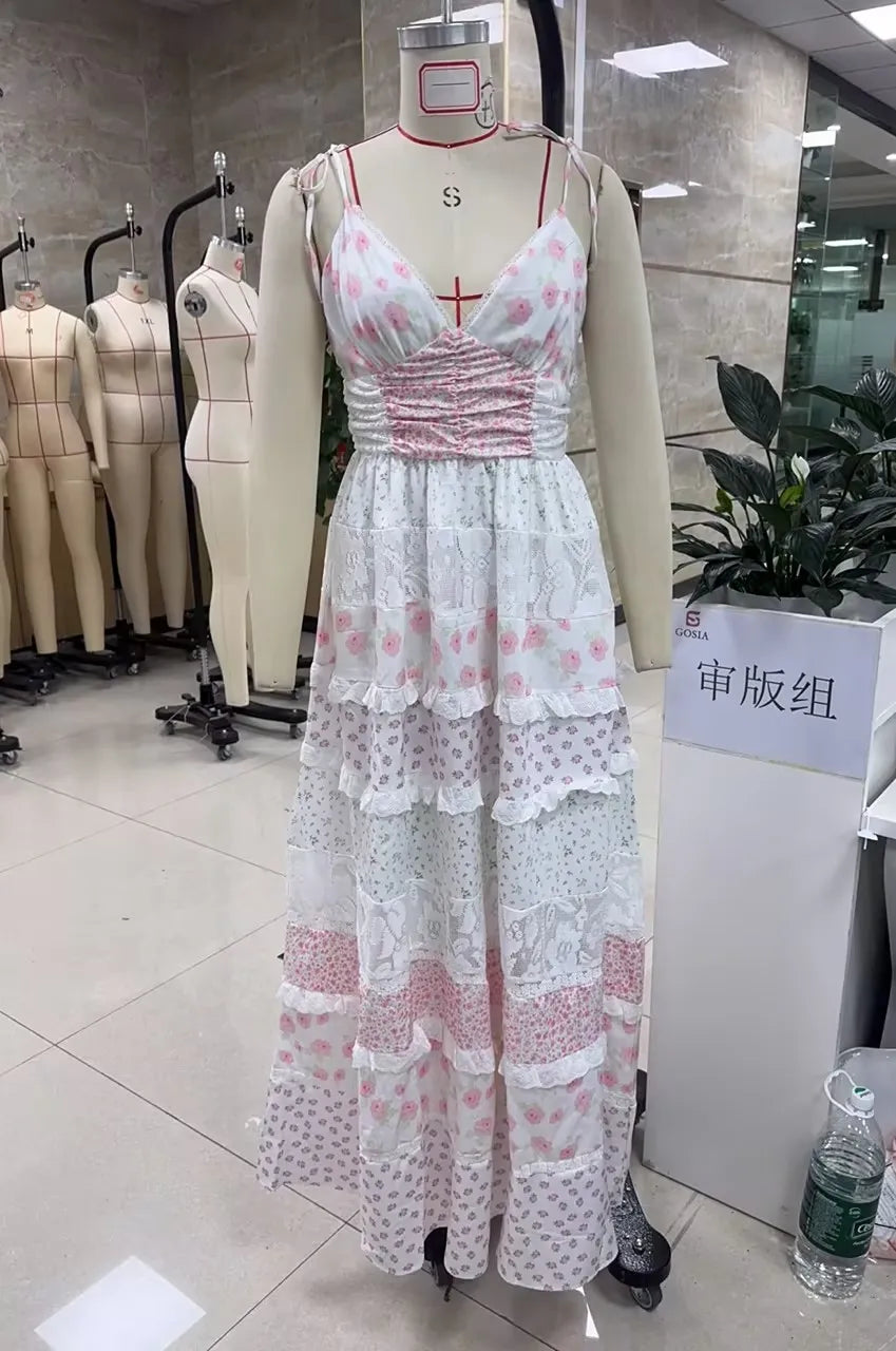 Women's sundress sun dress in white with pink floral designs, perfect for summer outings