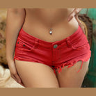 VacationGrabs red frayed hem denim shorts low rise distressed style on model with belly ring