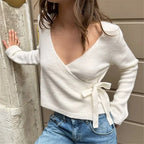 White sweater crop with wrap design and tie for stylish comfort