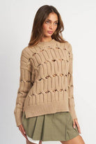 Emory Park women's sweater with slits in beige featuring a unique textured knit design