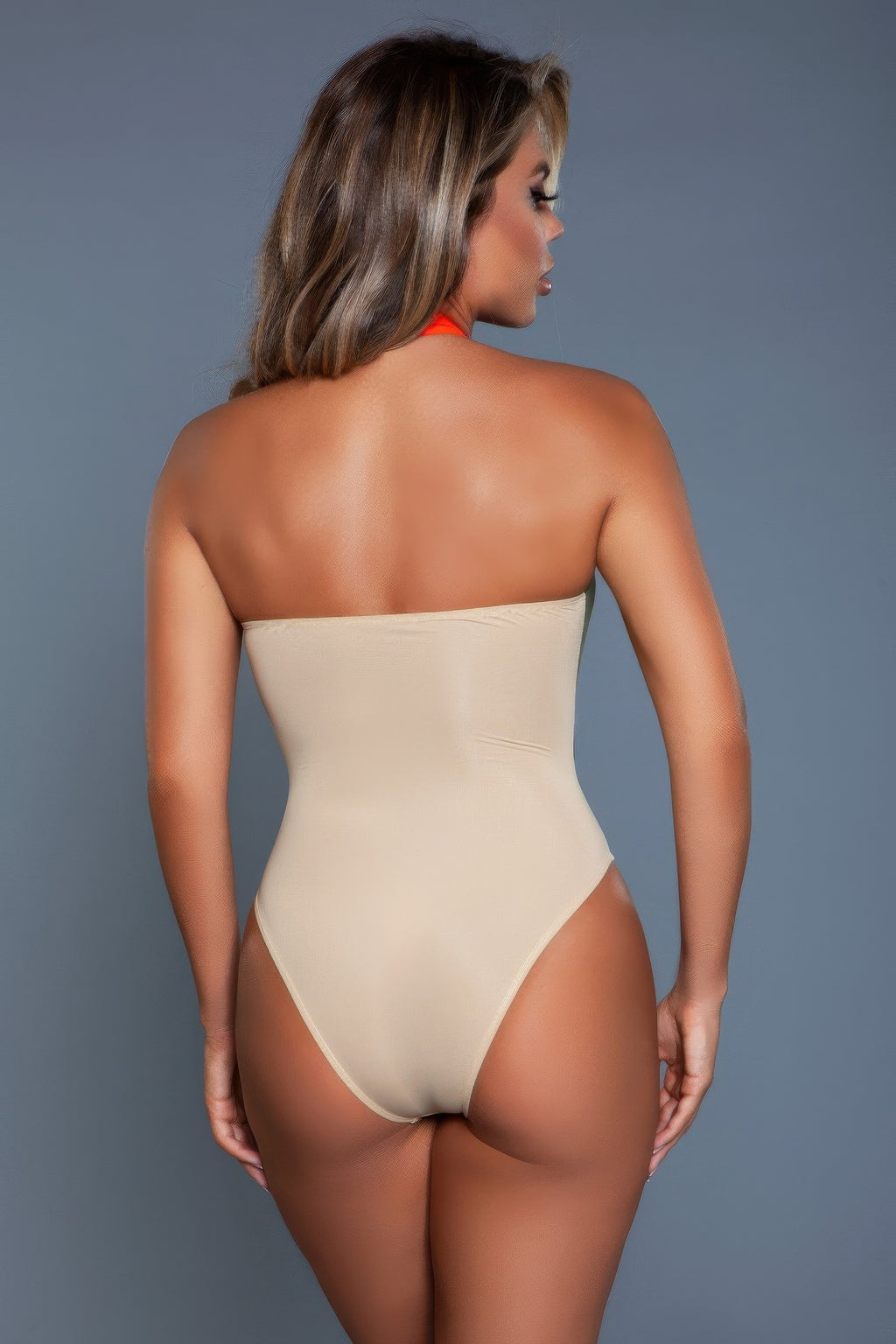 Women's beige strapless swimsuit, ideal for beach and poolside, from VacationGrabs