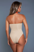 Women's beige strapless swimsuit, ideal for beach and poolside, from VacationGrabs