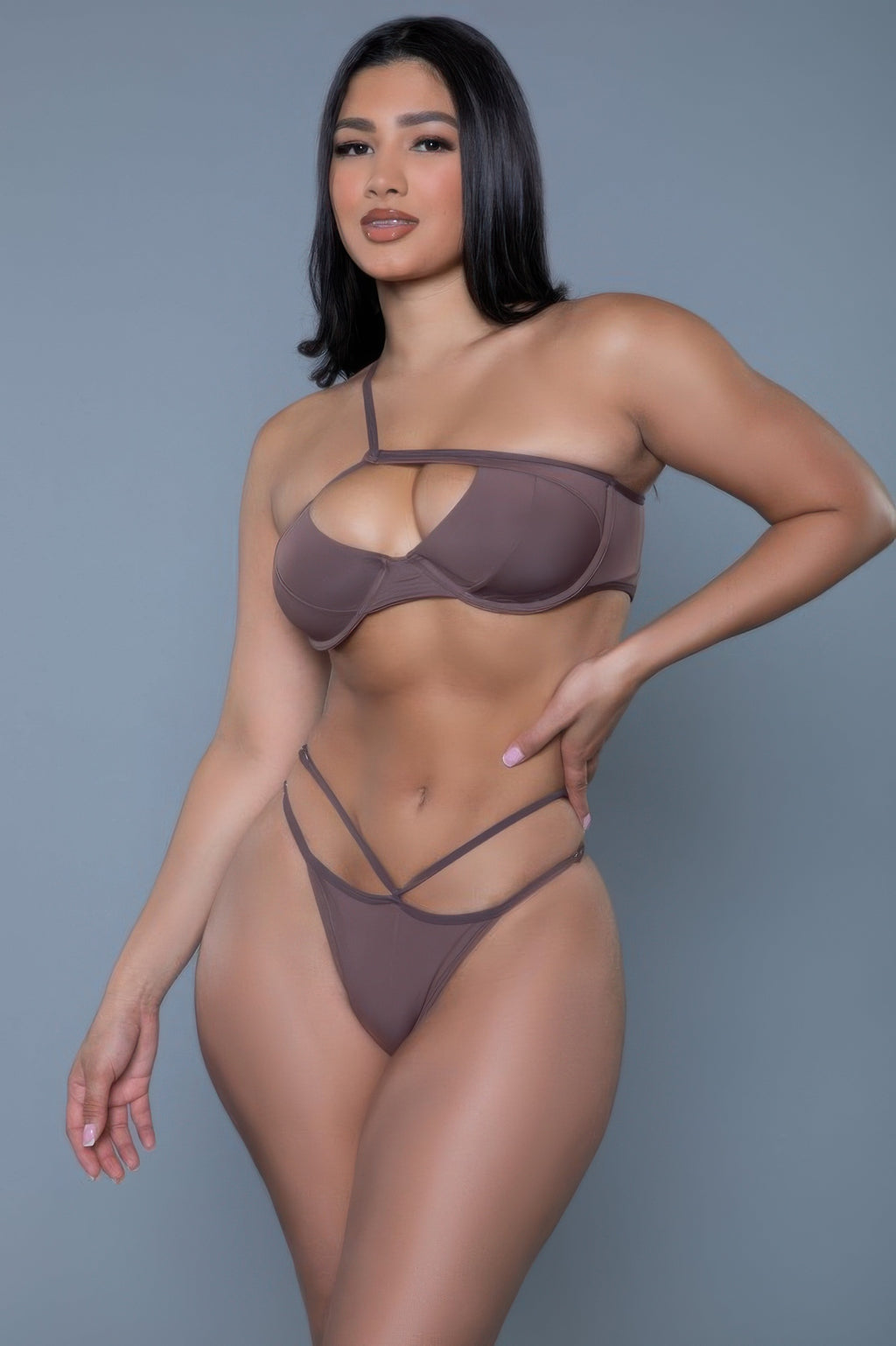 Women's brown swimsuit set, stylish cutout design, ideal for beach outings
