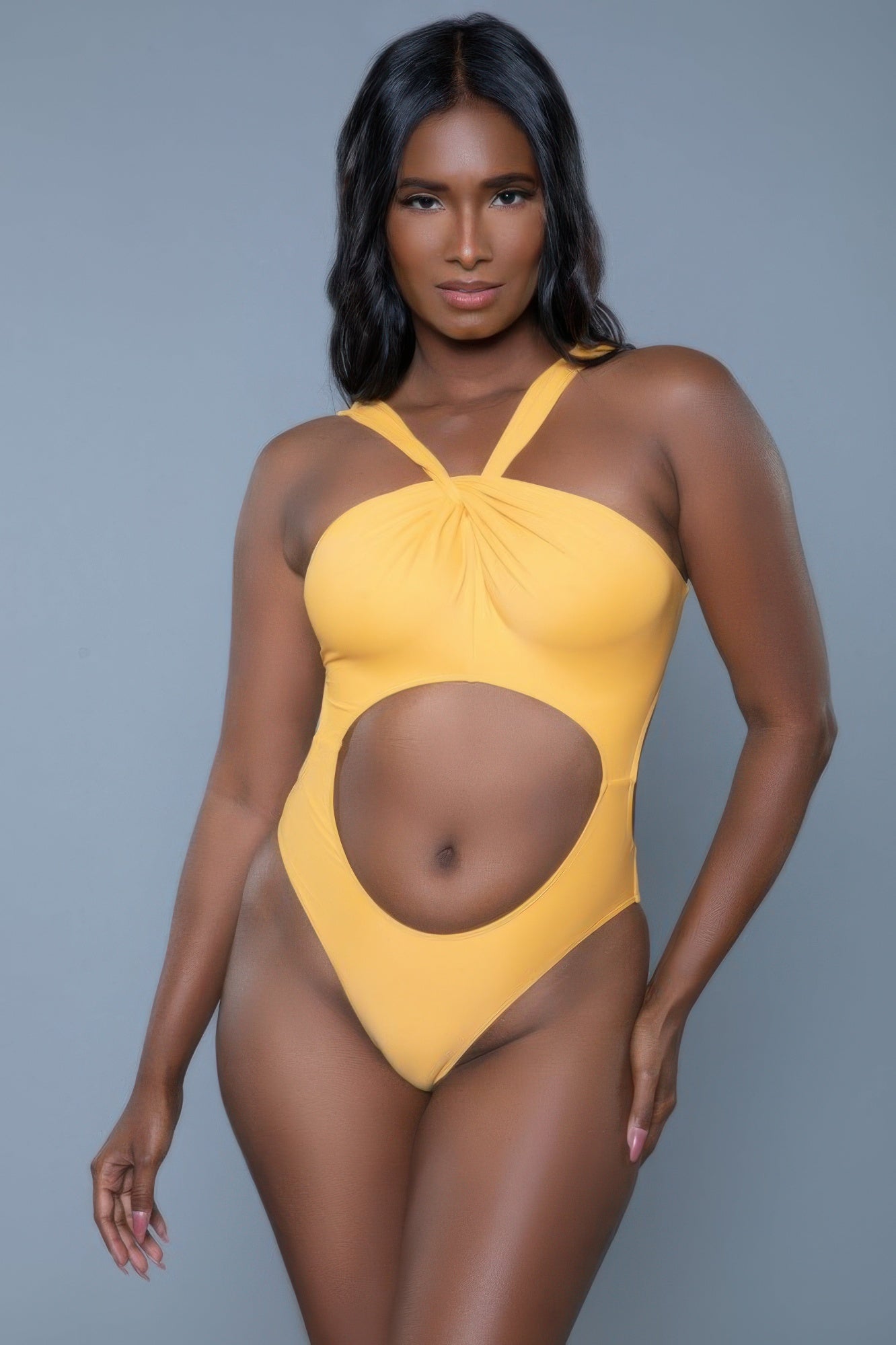Women's yellow cut-out one-piece swimmers swimwear for beach outings
