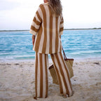 Women's striped swimsuit and cover up set, perfect for beach outings