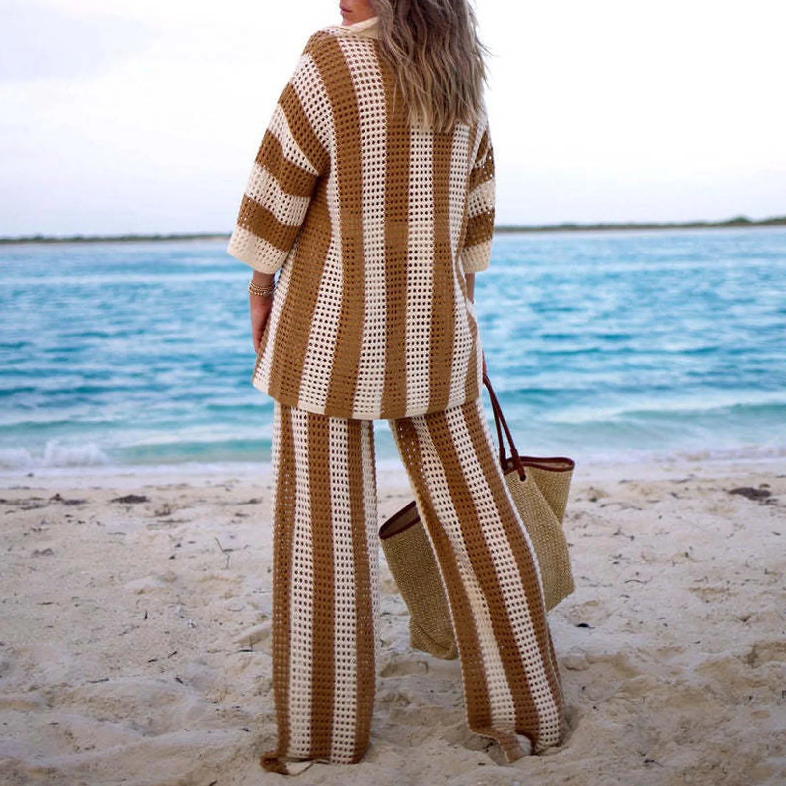 Women's striped swimsuit and cover up set, perfect for beach outings