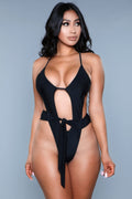 Women's black swimsuit with tie detail, perfect for beach outings