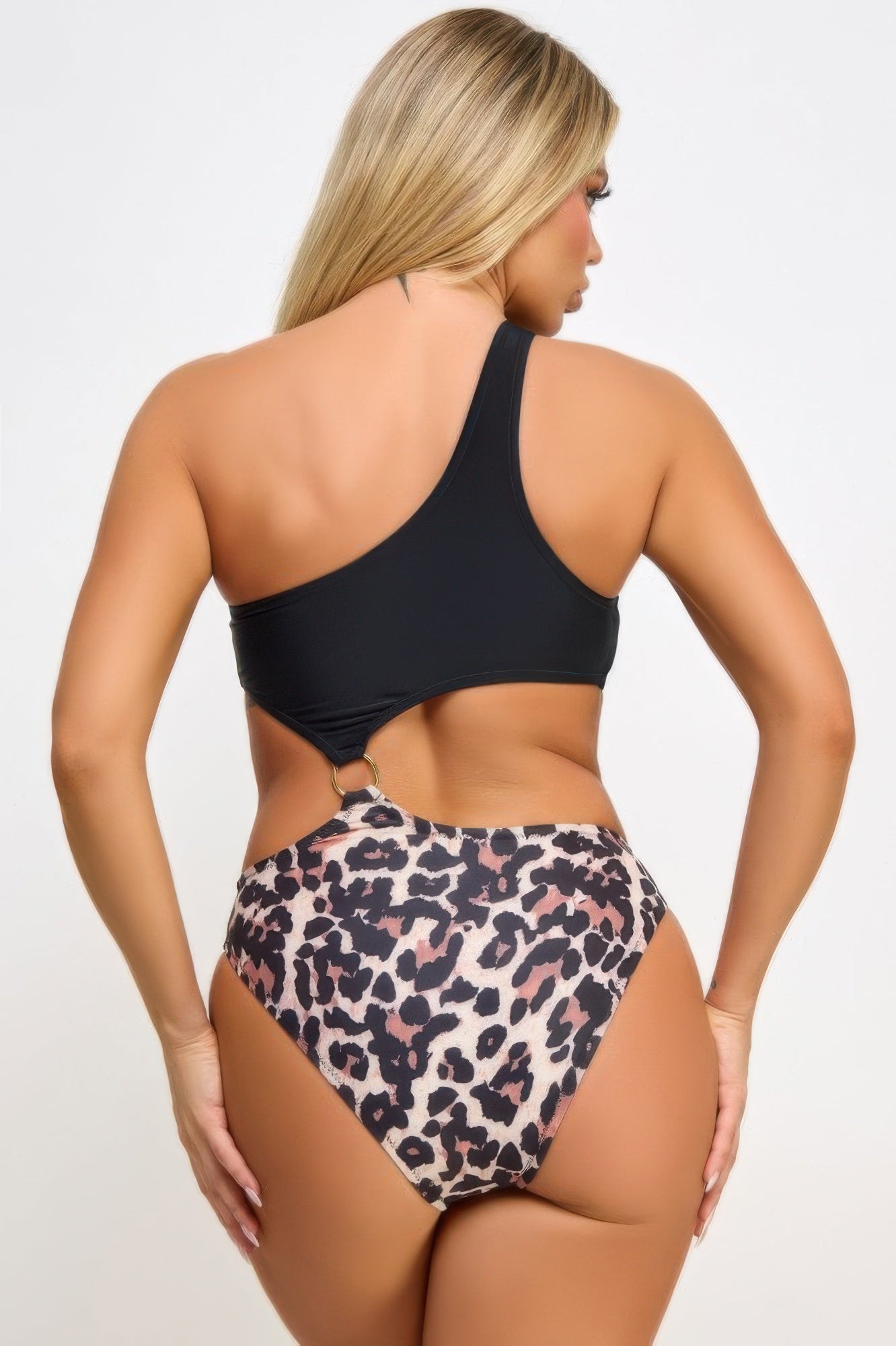 Women's leopard print and black swimsuit, perfect for beach outings