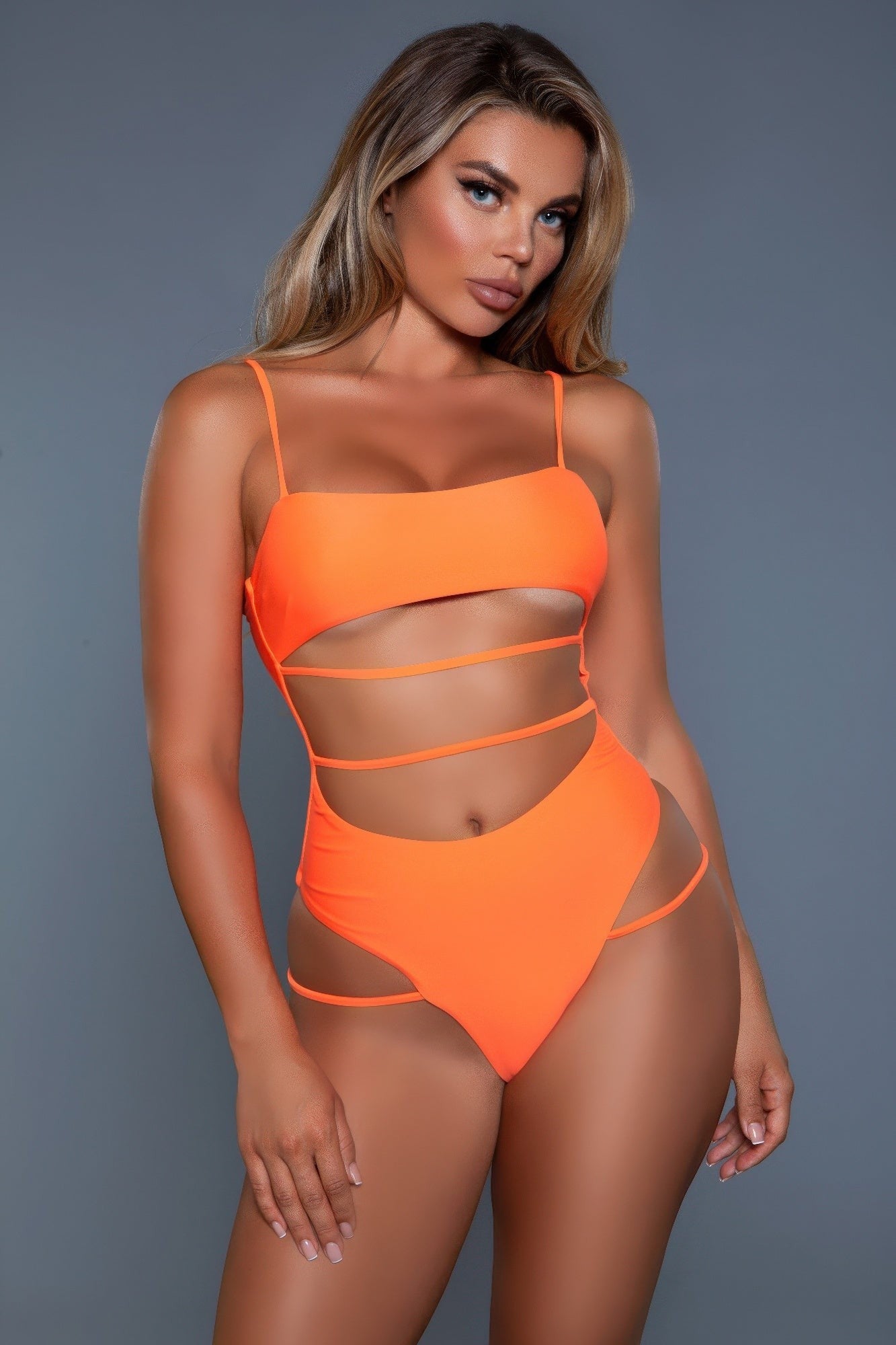 Women's orange swimwear swimsuit with cut-out design for beachwear
