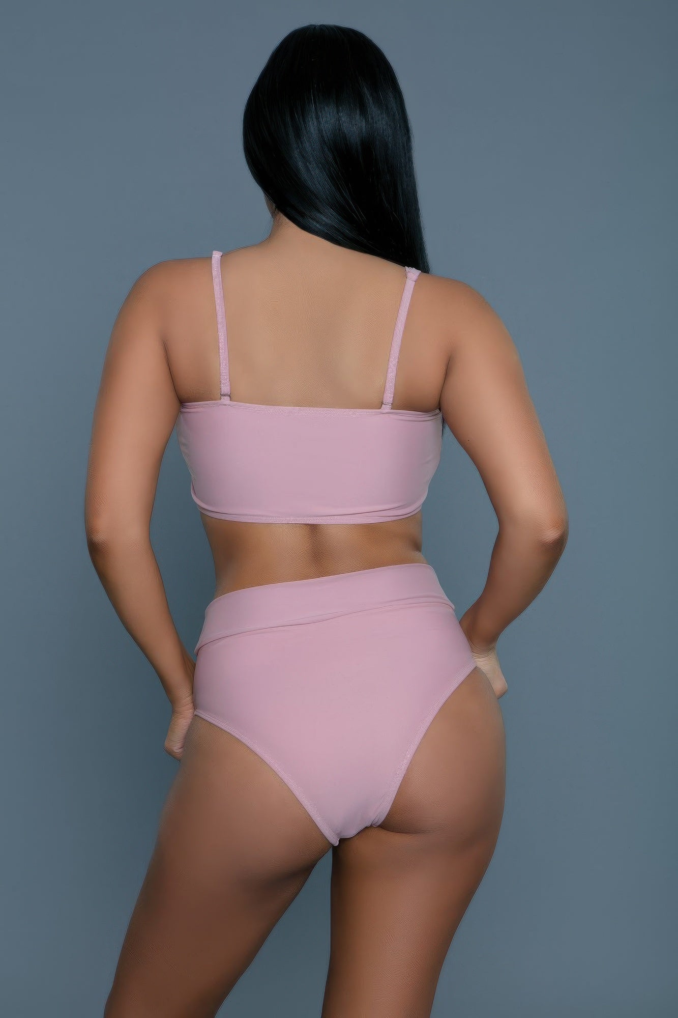 Women's pink high-waisted bikini swimsuit for beach outings