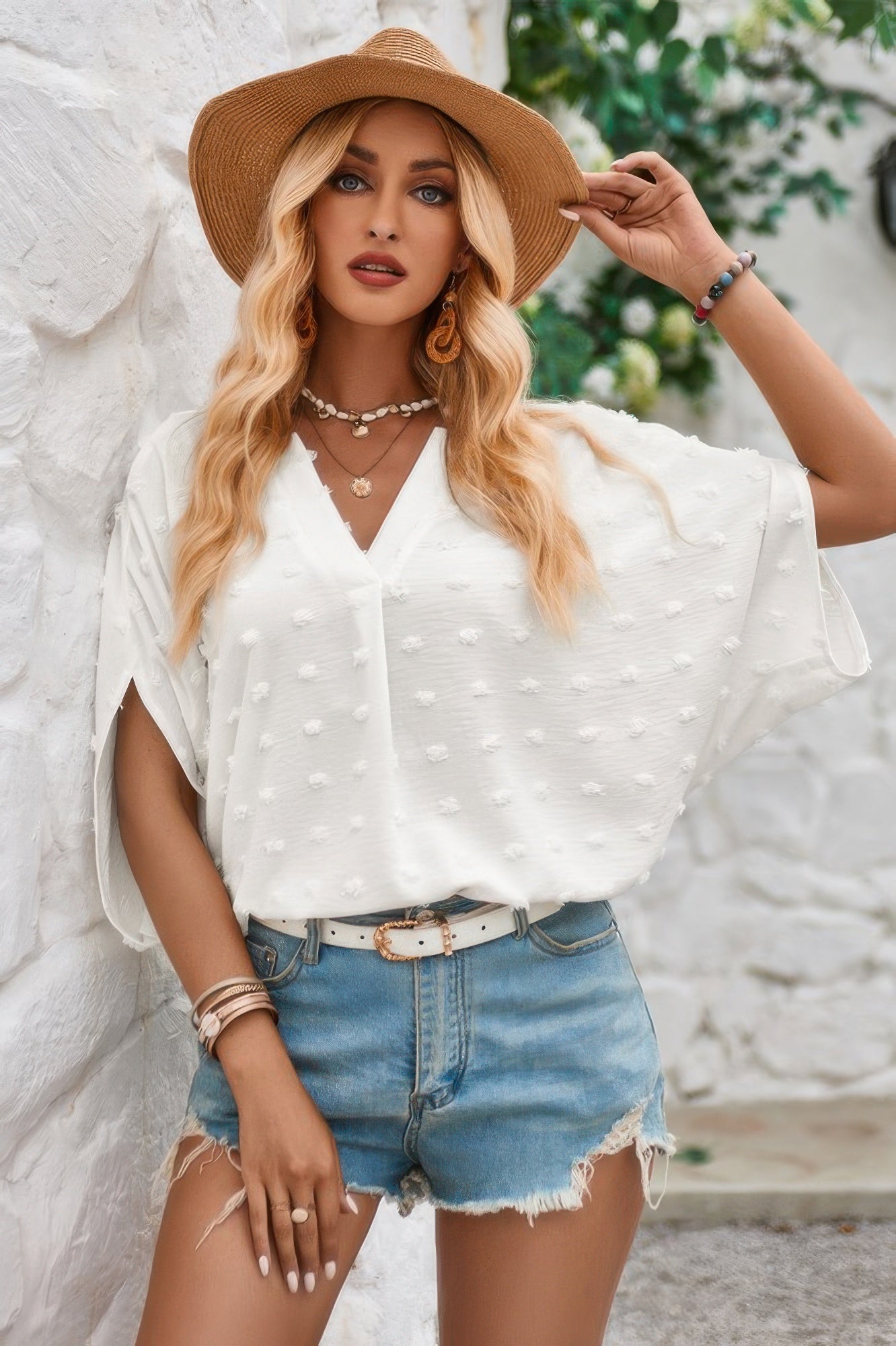 Stylish women's Swiss dot V neck blouse in white, perfect for summer outfits and casual wear