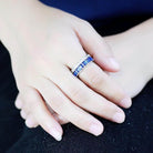 Elegant synthetic gemstone ring for women featuring a stunning blue design and silver accents