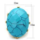 Synthetic turquoise fashion ring with a large oval stone and gold accents for stylish women