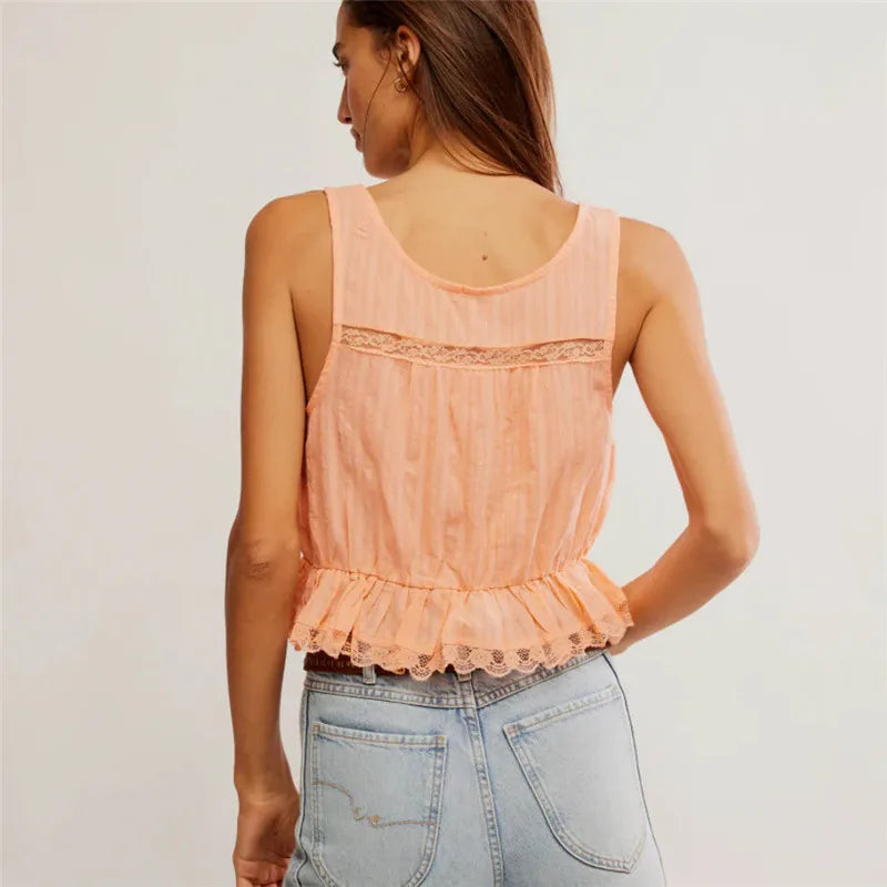 Women's peach tank top with lace, perfect for summer outings