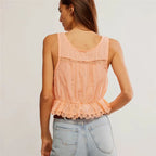 Women's peach tank top with lace, perfect for summer outings