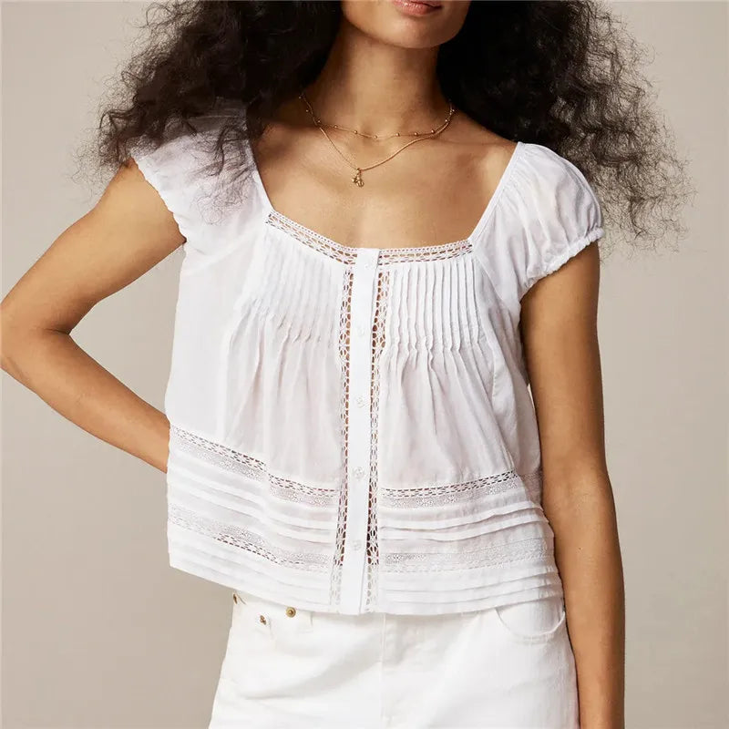 Women's white tank top with lace, perfect for summer outings