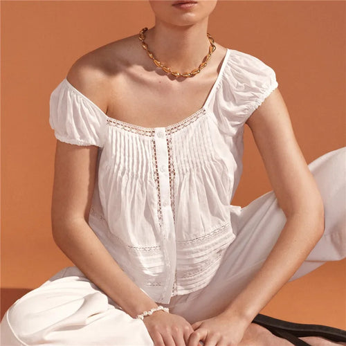 Women's white tank top with lace, perfect for summer outings