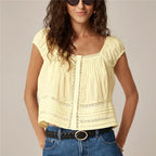 Women's yellow tank top with lace, perfect for casual summer outings