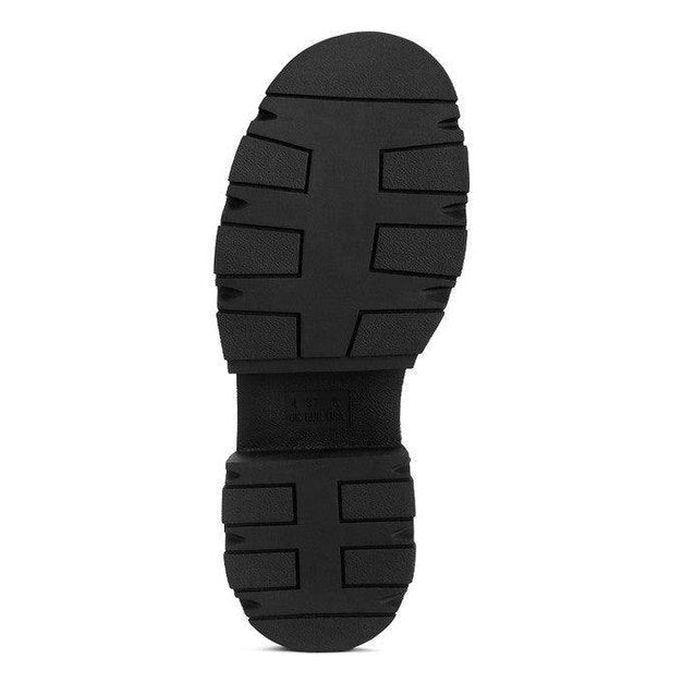 Sole of Rag Company's Tatum combat boots featuring a durable tread for excellent grip and traction
