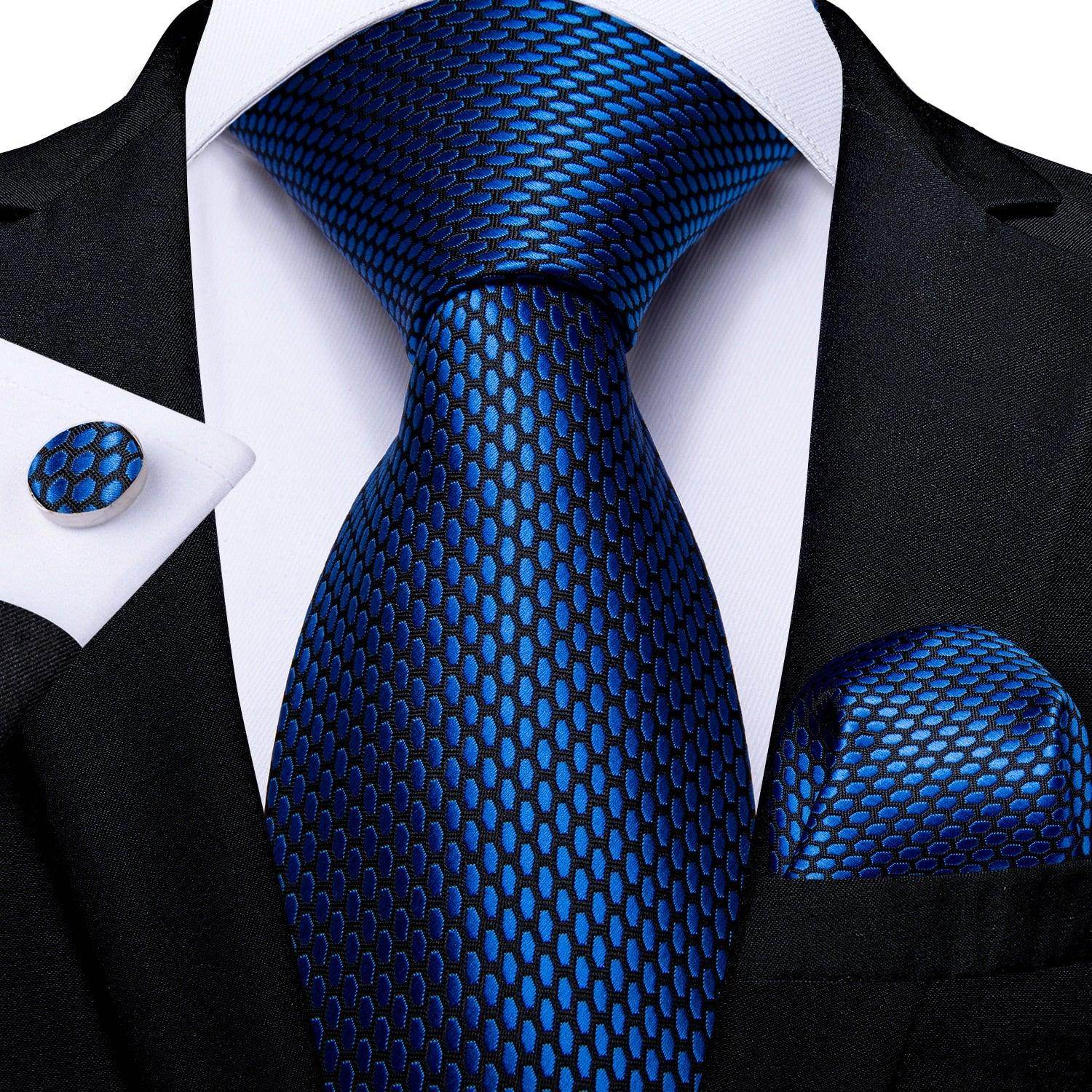 Teal blue paisley necktie with coordinating pocket square and cufflinks, perfect for stylish men's accessories