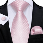 Luxury teal blue paisley necktie styled with matching cufflinks for elegant men's accessories