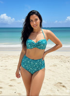 VacationGrabs teal high waist bikini on a model at the beach with ocean background