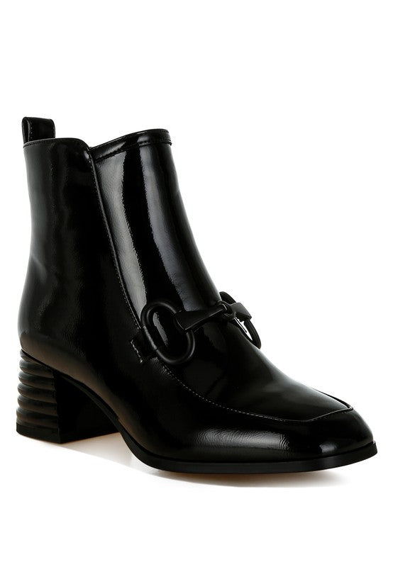 Stylish textured ankle boots for women with a sleek black finish and a fashionable block heel