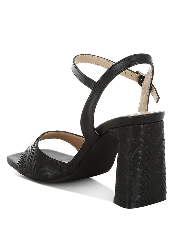 Women's textured faux leather heels with a block heel design