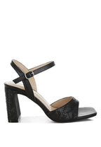 Women's black textured faux leather heels for stylish occasions