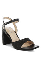 Women's black textured faux leather heels for stylish occasions