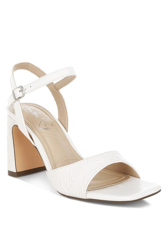 Women's white textured faux leather heels for elegant occasions