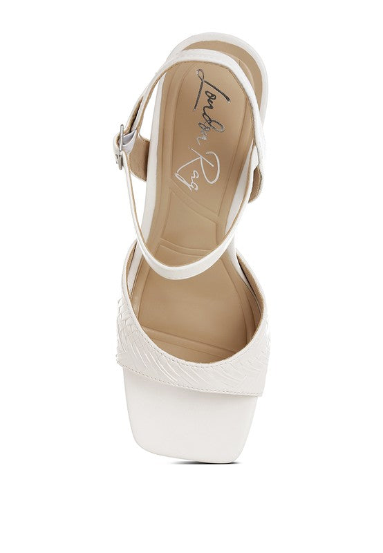 Women's white textured faux leather heels for stylish occasions