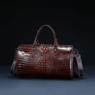 Textured leather travel bag by VacationGrabs in rich burgundy color with stylish handles and strap