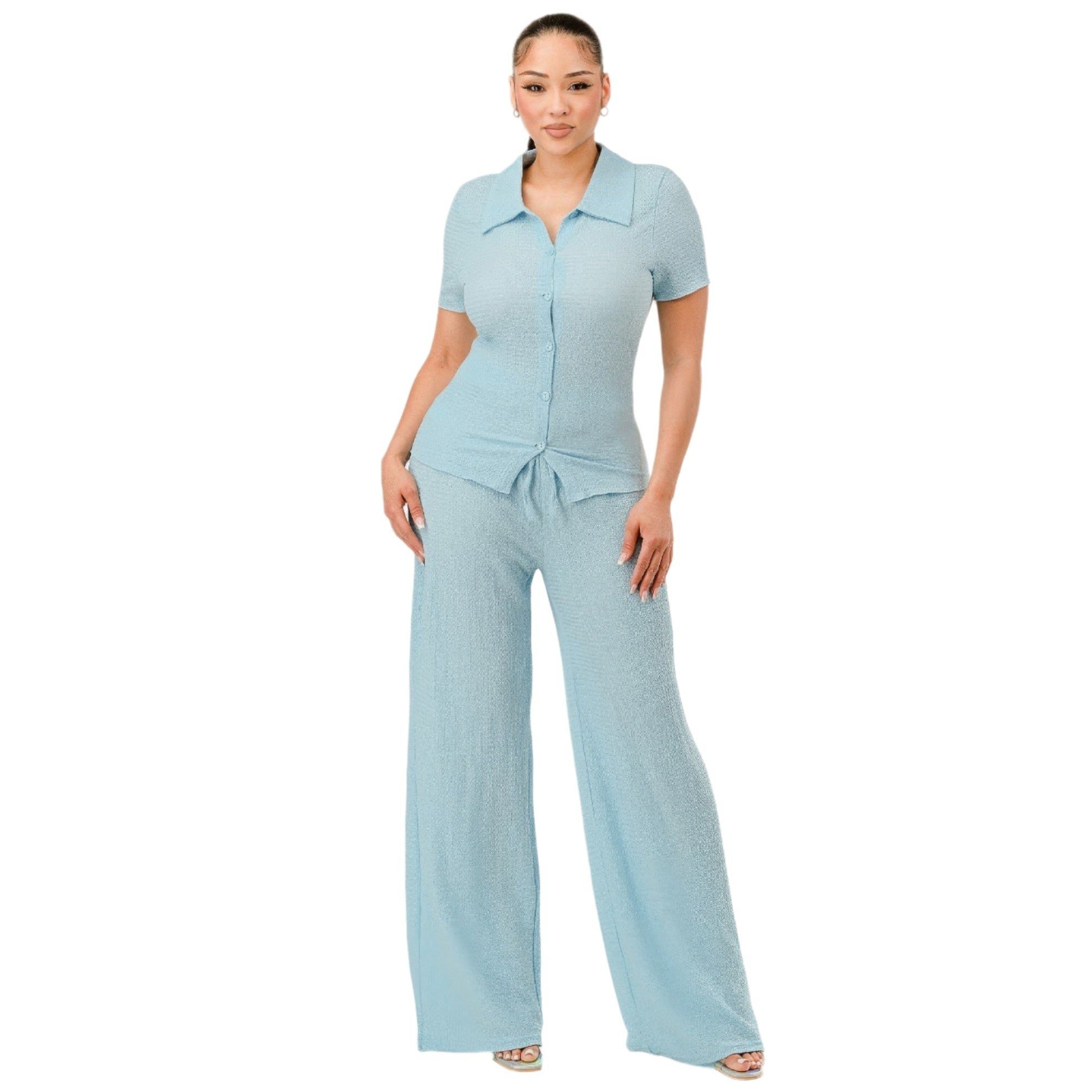 Woman wearing a light blue textured polo set for women with short sleeves and wide-leg pants