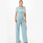 Light blue textured polo set for women with short sleeve shirt and wide leg pants