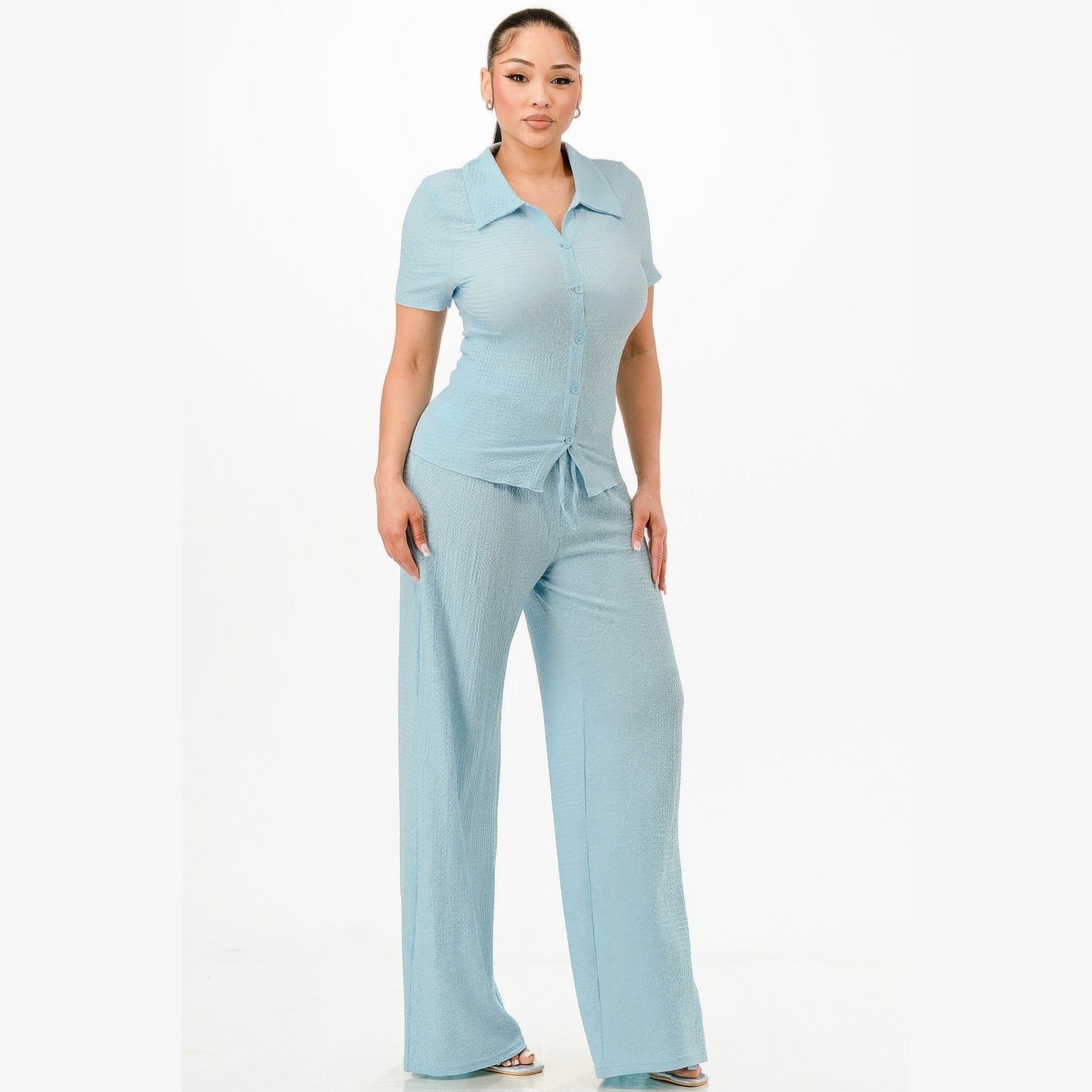 Light blue textured polo set for women with short sleeve shirt and wide leg pants