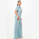 Woman wearing light blue textured polo set for women with short sleeves and wide-leg pants