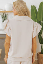 Back view of JUNIPER BLVD textured ruffle lounge set in soft beige with stylish ruffle sleeves