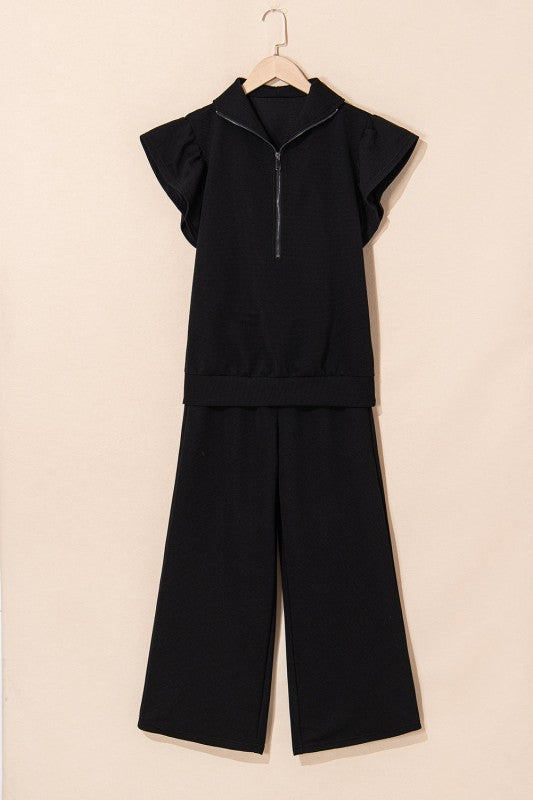 JUNIPER BLVD textured ruffle lounge set in black with short sleeves and wide-leg pants