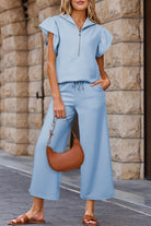 JUNIPER BLVD textured ruffle lounge set in light blue with a zip-up top and wide-leg pants