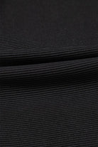 Close-up image of textured ruffle lounge set by JUNIPER BLVD showcasing ribbed fabric detail