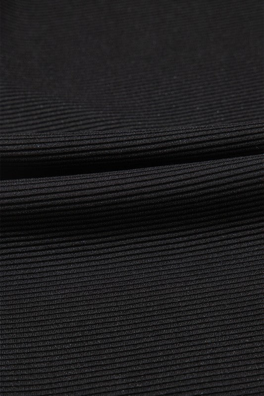 Close-up image of textured ruffle lounge set by JUNIPER BLVD showcasing ribbed fabric detail