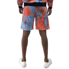 Back view of tie dye lounge shorts for men in blue and orange by WEIV, worn with white sneakers